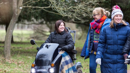 Family exploring the garden in winter at Shugborough Estate, Staffordshire